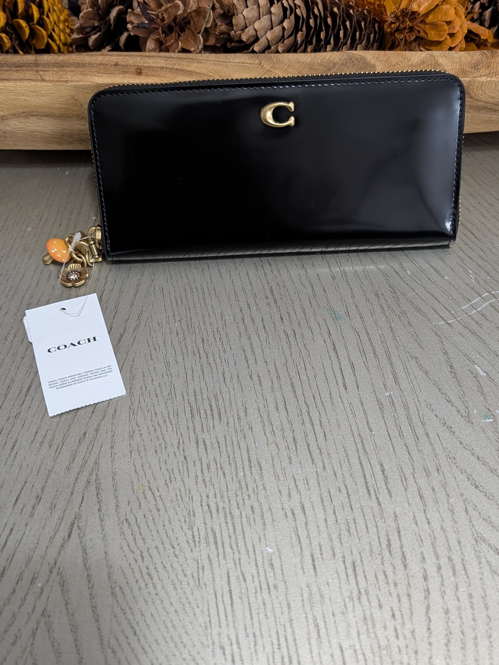 Coach Patent Leather Zip Wallet in Black with Charm